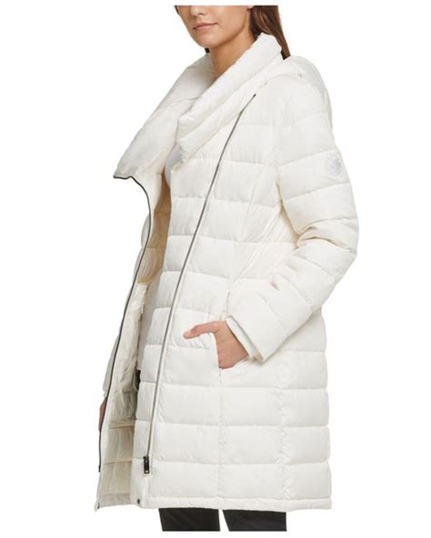 Ivory Oversized Nylon Puffer Coat .